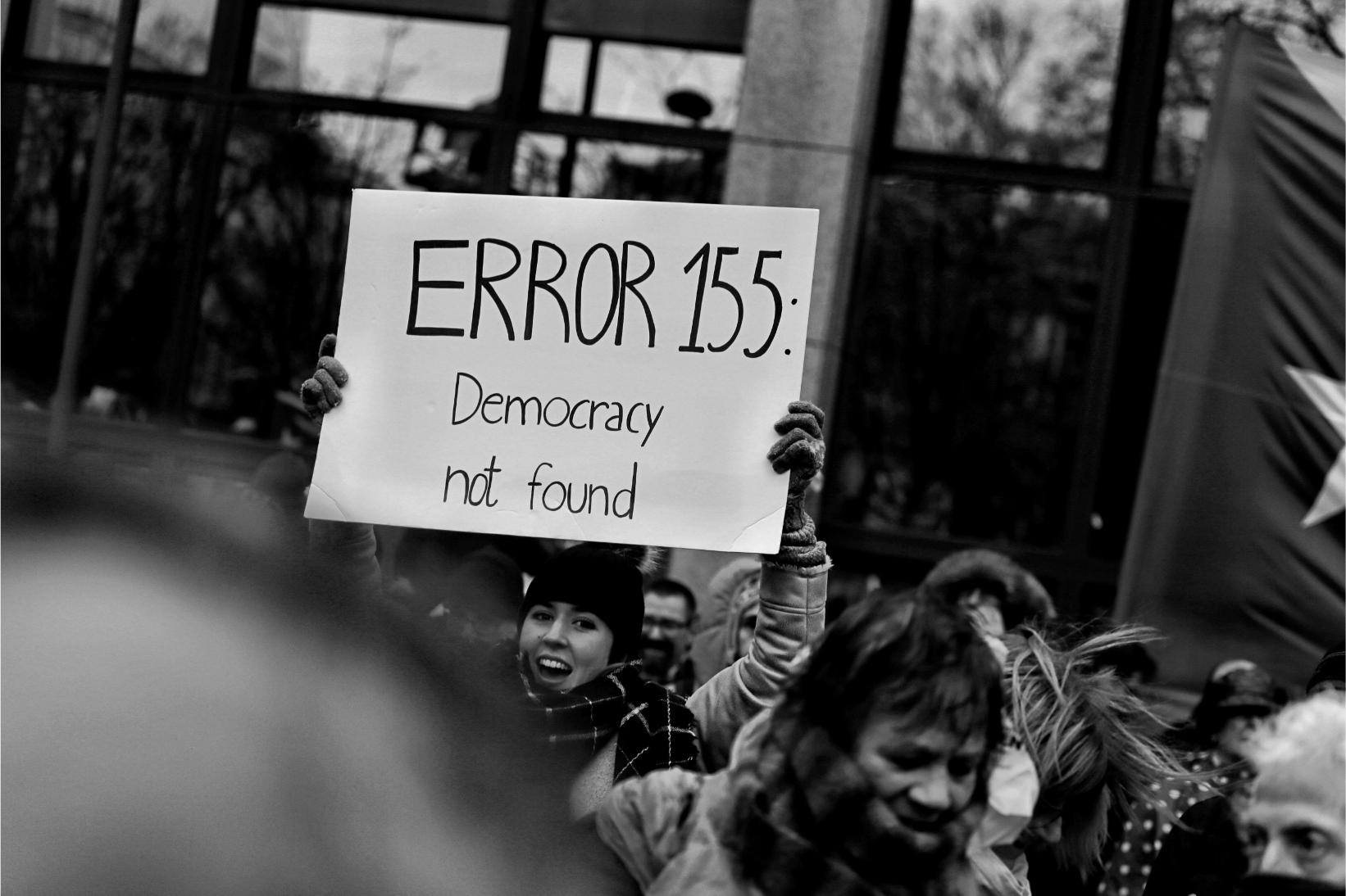 Person Holding A Placard, Democracy Not Found